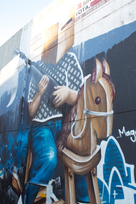 By the Tattoo Parlour - Ah the old Cardboard Box Knight on a rockinghorse scenario. I didn't say you had to understand it! 