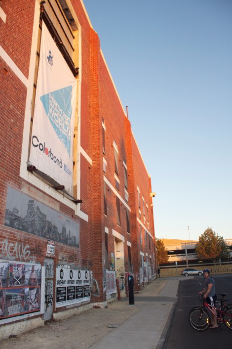 The Old Woolstores - Where most of the best graffiti is. (And Simon on a bike). 
