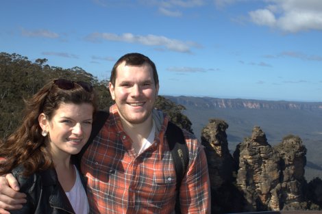 In front of the three sisters.